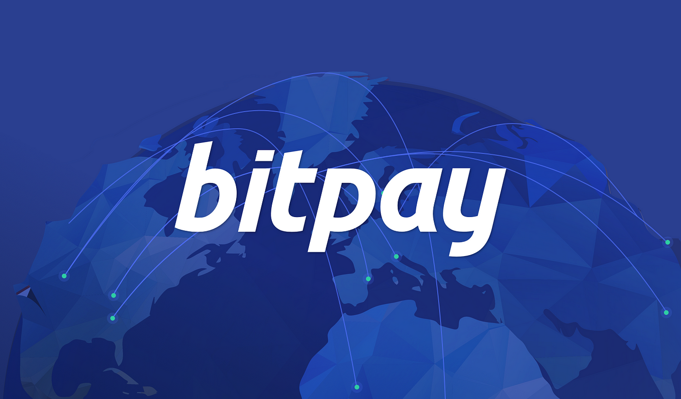 bitpay logo on top of connected globe