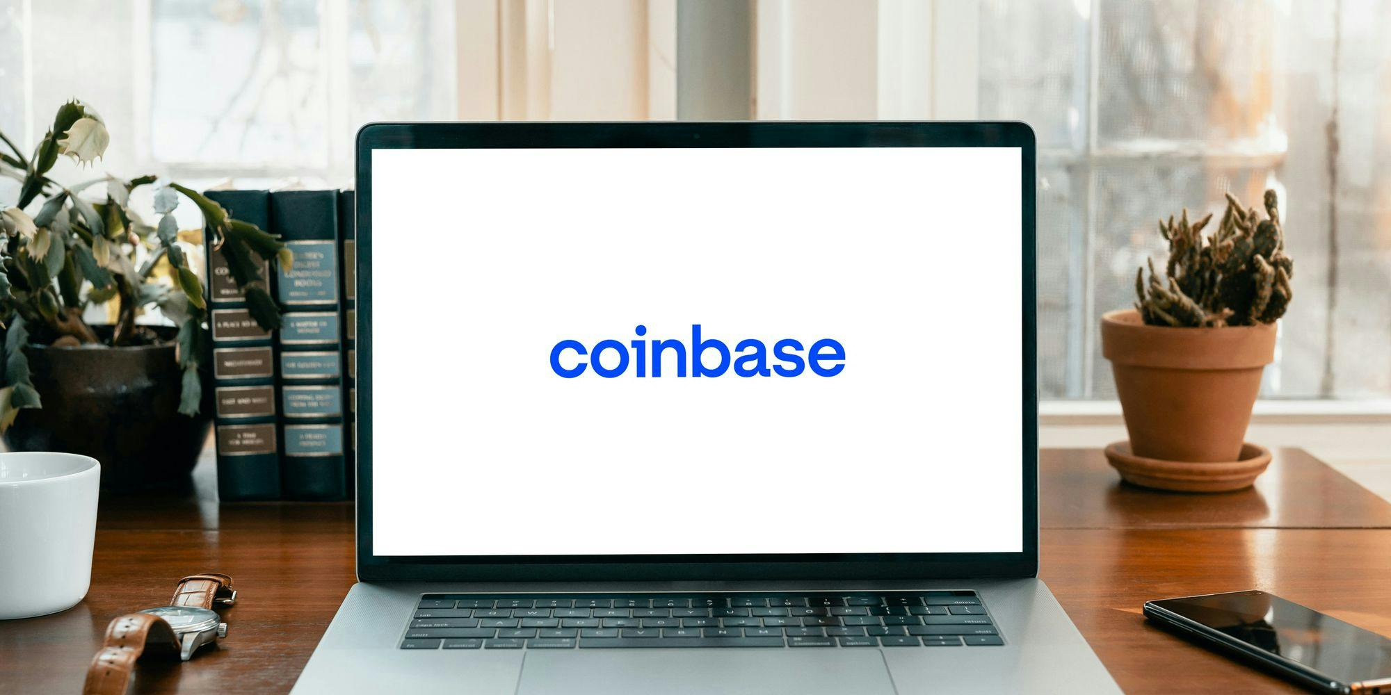 coinbase logo on a laptop