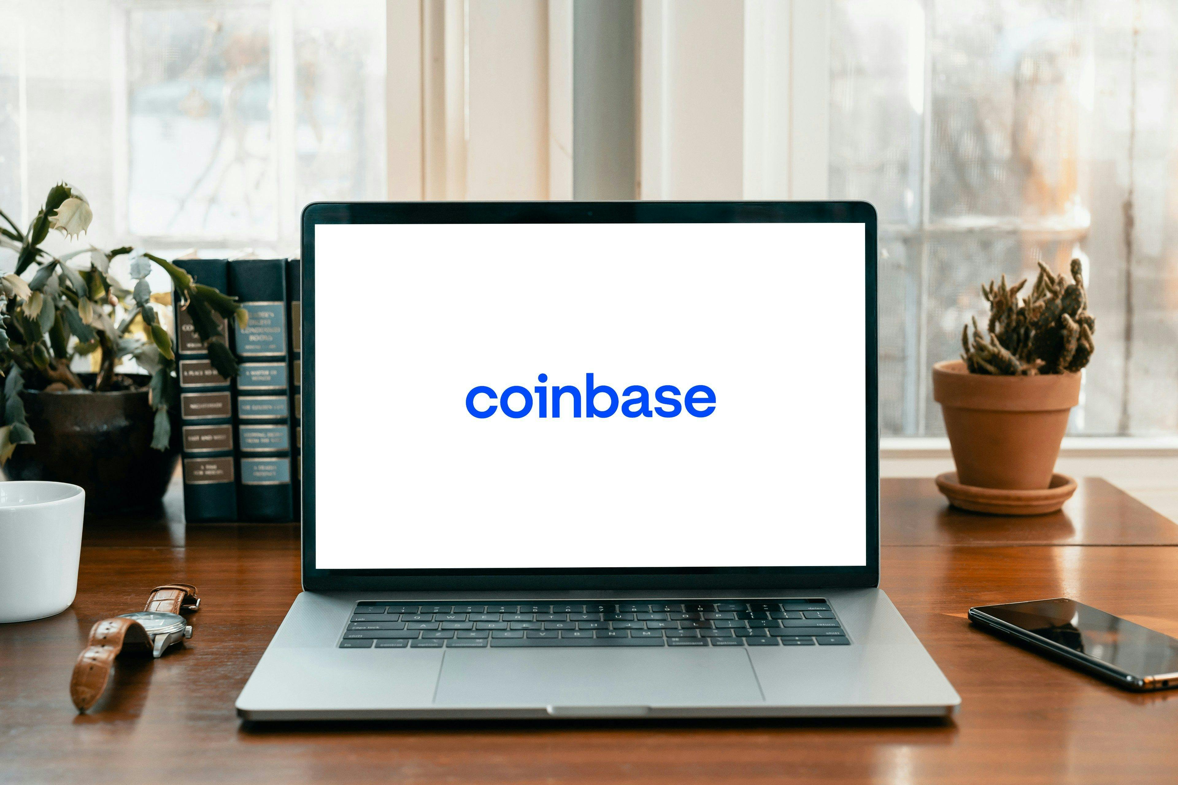 coinbase logo on a laptop